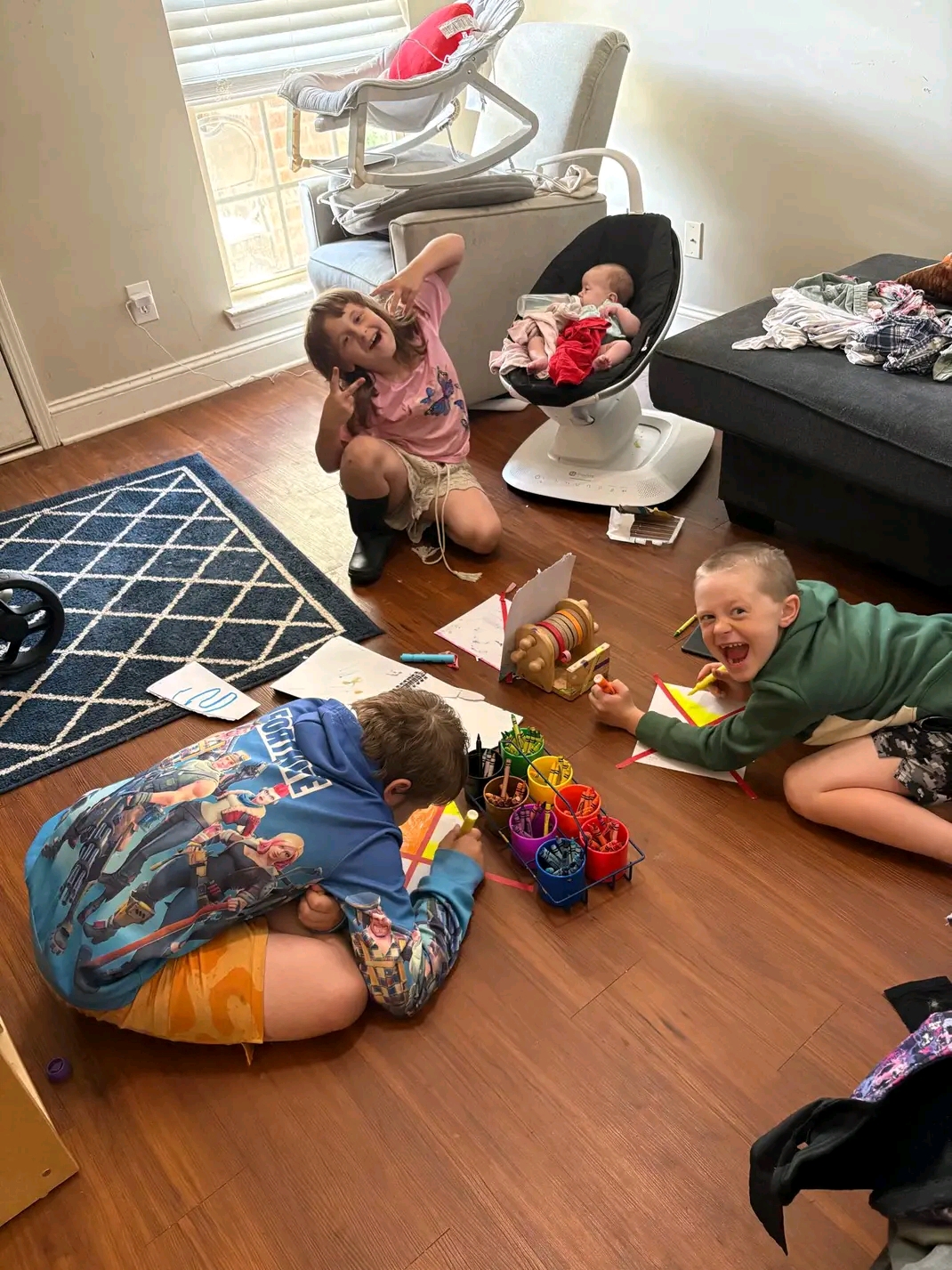 Sarah's kids coloring together at home on a homeschool morning